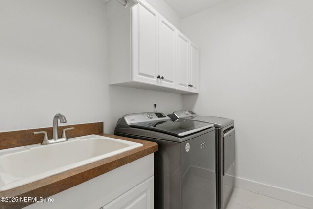 95544 Wilder Blvd, Fernandina Beach, FL 32034 - laundry area featuring washer and dryer and cabinet space
