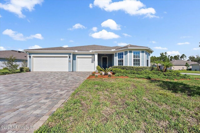 261 Sand Harbor Dr, Ponte Vedra, FL 32081 - ranch-style house with decorative driveway and a garage