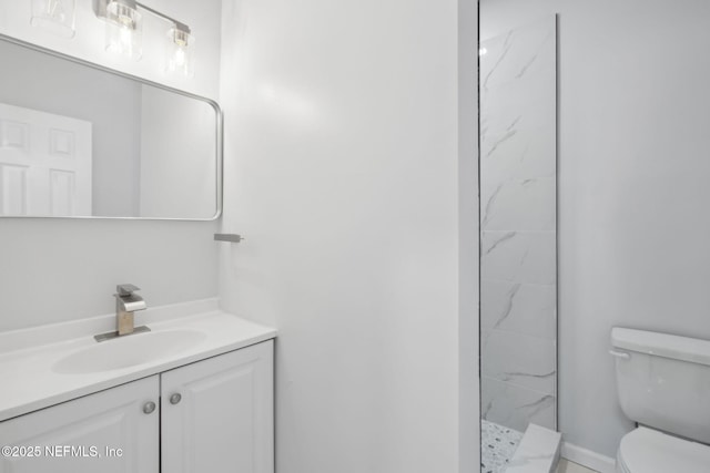 2010 N Main St, Jacksonville, FL 32206 - full bathroom featuring toilet, vanity, and a marble finish shower