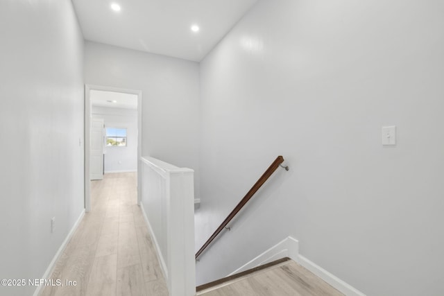 2010 N Main St, Jacksonville, FL 32206 - corridor with an upstairs landing, light wood-style floors, recessed lighting, and baseboards