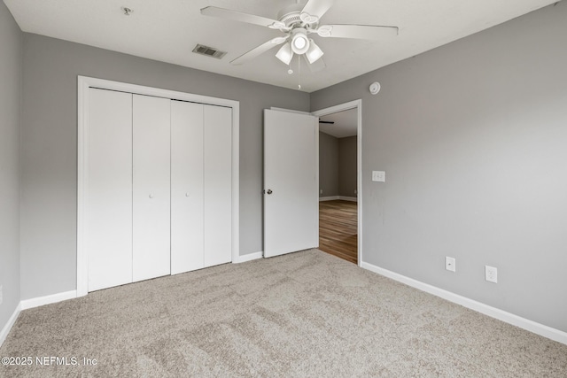 7701 Timberlin Park Blvd Unit 331, Jacksonville, FL 32256 - unfurnished bedroom with baseboards, carpet flooring, a closet, and ceiling fan