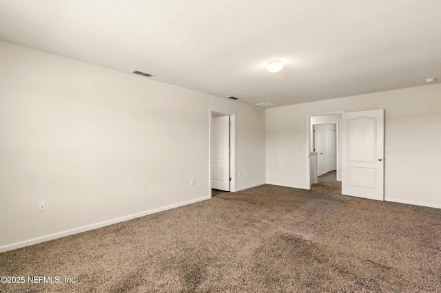 3238 Little Fawn Ln, Green Cove Springs, FL 32137 - empty room featuring dark colored carpet and baseboards