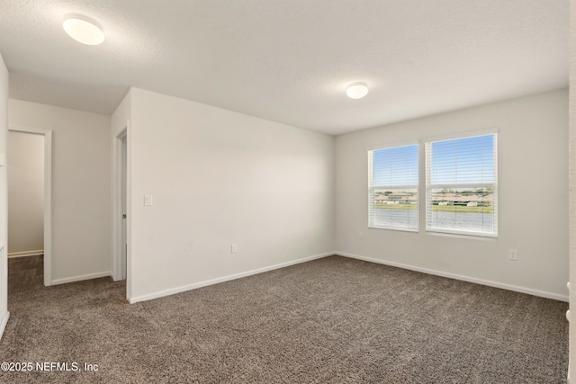 3238 Little Fawn Ln, Green Cove Springs, FL 32137 - carpeted spare room featuring baseboards and a textured ceiling