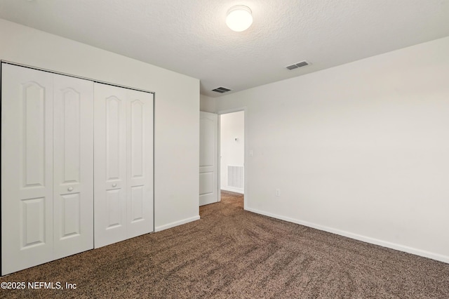 3238 Little Fawn Ln, Green Cove Springs, FL 32137 - unfurnished bedroom featuring carpet floors, baseboards, a textured ceiling, and a closet