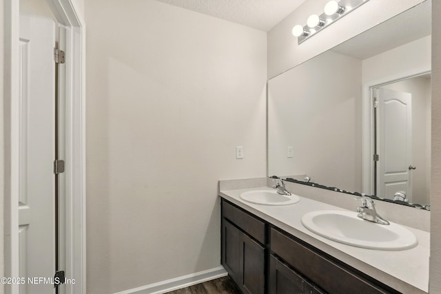 3238 Little Fawn Ln, Green Cove Springs, FL 32137 - bathroom featuring double vanity and wood finished floors