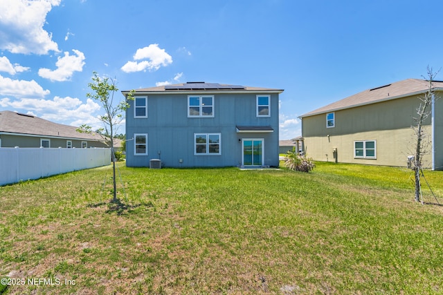 3238 Little Fawn Ln, Green Cove Springs, FL 32137 - rear view of house with solar panels and cooling unit