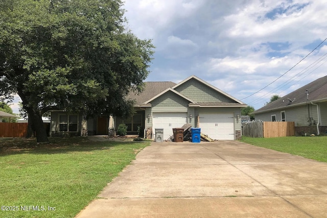 7602 Blackjack Cir, Navarre, FL 32566 - craftsman house featuring an attached garage, driveway, and stone siding