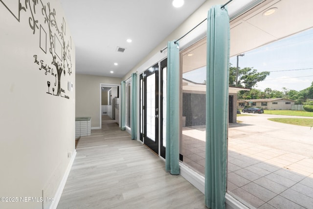 7930 Bellemeade Blvd, Jacksonville, FL 32211 - corridor with plenty of natural light, light wood finished floors, and recessed lighting
