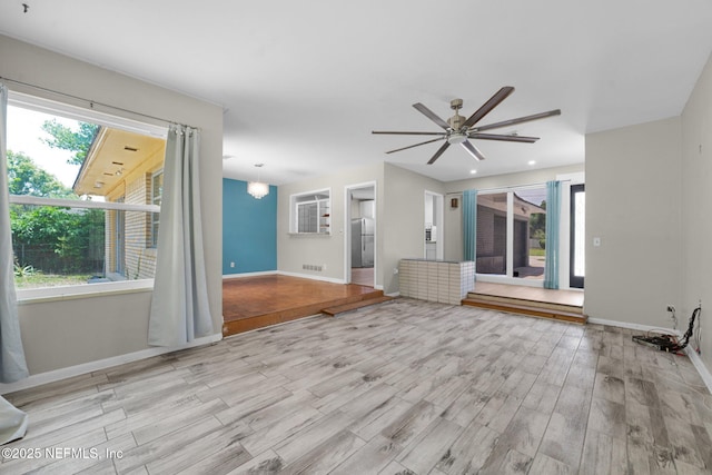 7930 Bellemeade Blvd, Jacksonville, FL 32211 - unfurnished living room featuring wood finished floors and ceiling fan