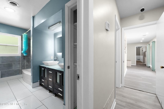 7930 Bellemeade Blvd, Jacksonville, FL 32211 - full bath featuring vanity, shower / washtub combination, and wood finished floors