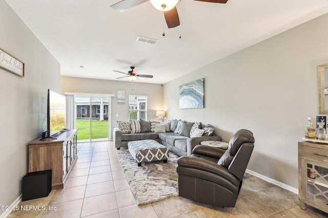 236 Servia Dr, Saint Johns, FL 32259 - living area with ceiling fan, baseboards, and light tile patterned floors
