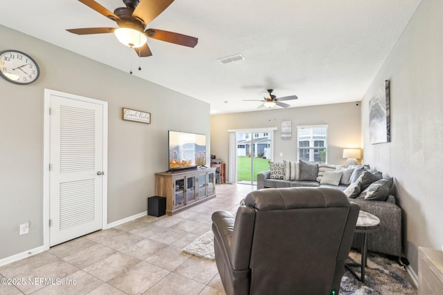 236 Servia Dr, Saint Johns, FL 32259 - living area featuring ceiling fan, light tile patterned floors, and baseboards