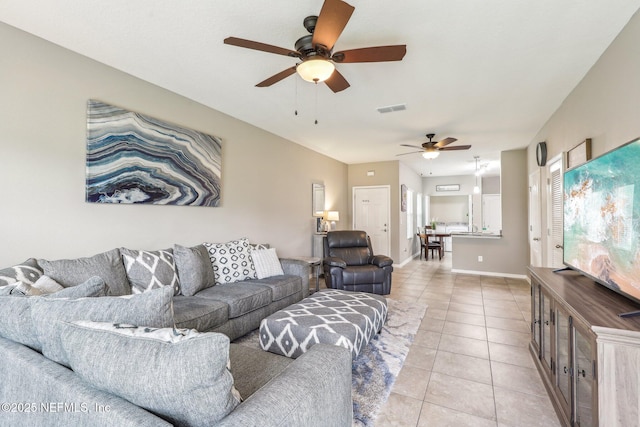 236 Servia Dr, Saint Johns, FL 32259 - living area with a ceiling fan, light tile patterned floors, and baseboards