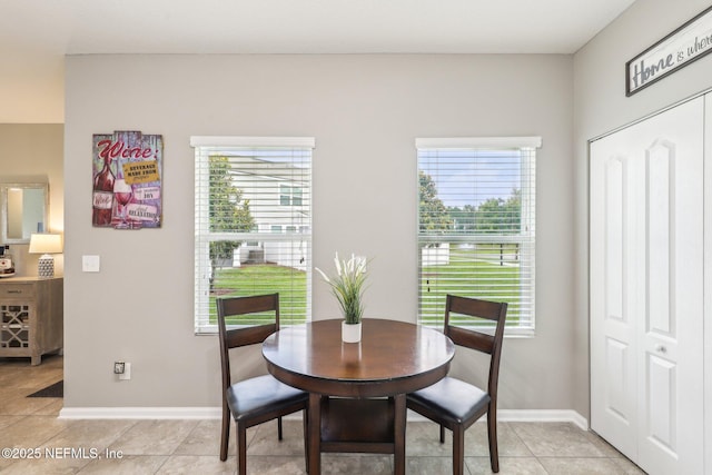236 Servia Dr, Saint Johns, FL 32259 - dining room with baseboards and light tile patterned floors