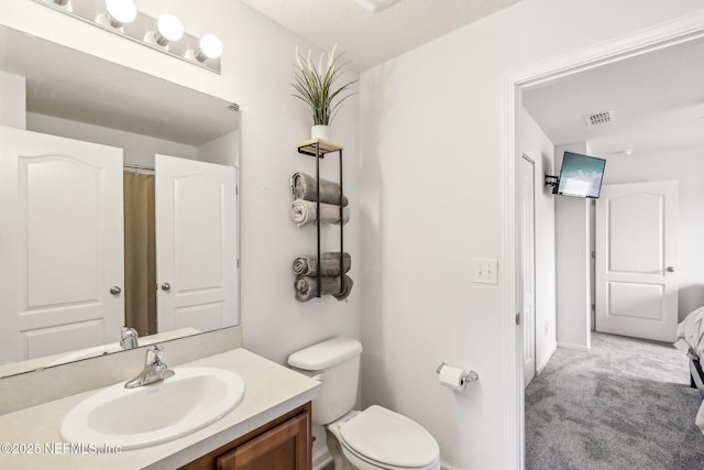 236 Servia Dr, Saint Johns, FL 32259 - bathroom featuring vanity, toilet, and baseboards