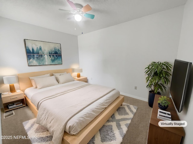1127 Romaine Cir W, Jacksonville, FL 32225 - carpeted bedroom featuring baseboards and ceiling fan