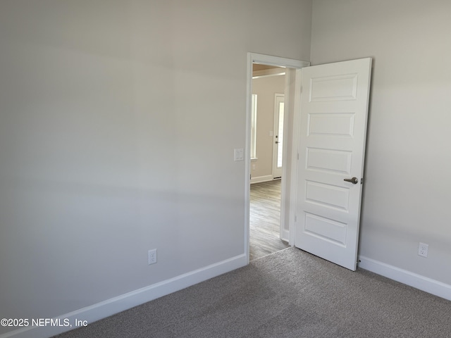 8322 Helmsley Blvd, Jacksonville, FL 32219 - unfurnished room featuring baseboards and carpet