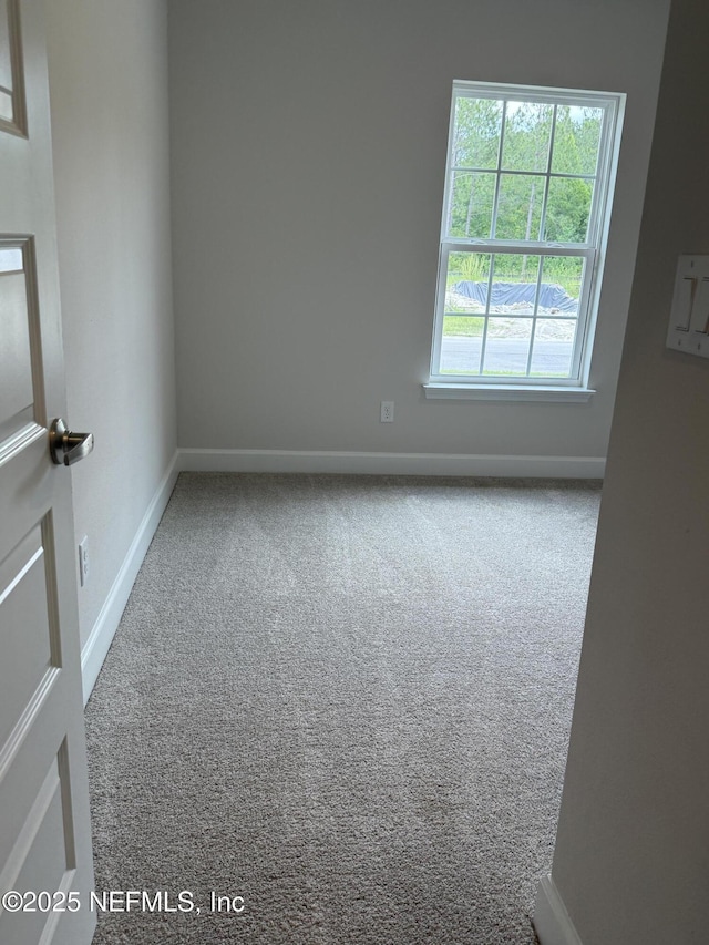 8316 Helmsley Blvd, Jacksonville, FL 32219 - carpeted spare room with baseboards