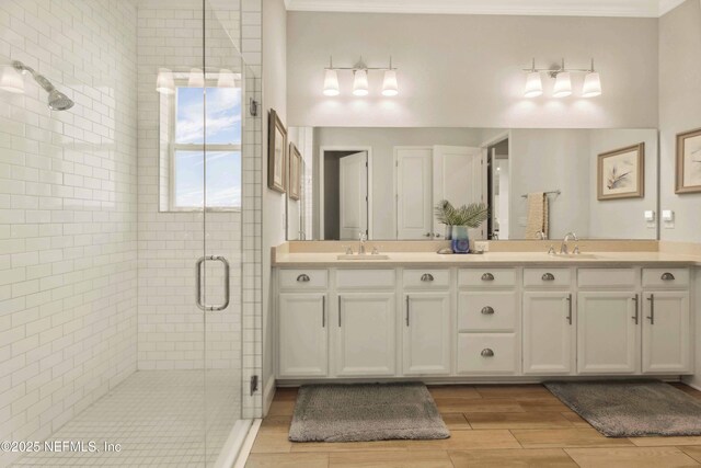 228 Waterline Dr, Saint Johns, FL 32259 - full bath with a stall shower, double vanity, wood tiled floors, and ornamental molding