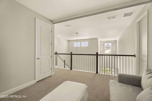 228 Waterline Dr, Saint Johns, FL 32259 - living area with carpet, baseboards, and an upstairs landing