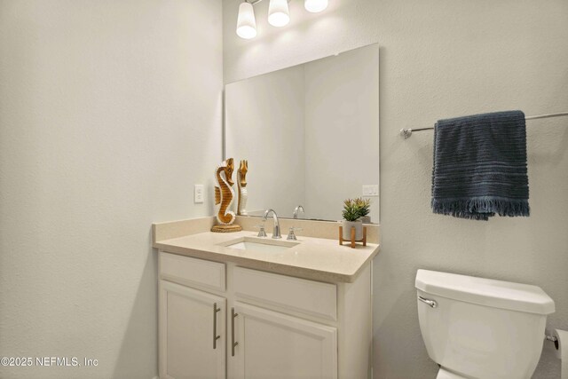 228 Waterline Dr, Saint Johns, FL 32259 - half bathroom with toilet and vanity