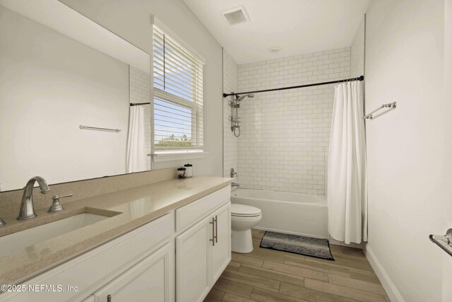 228 Waterline Dr, Saint Johns, FL 32259 - full bath featuring vanity, toilet, shower / bath combination with curtain, and wood finished floors