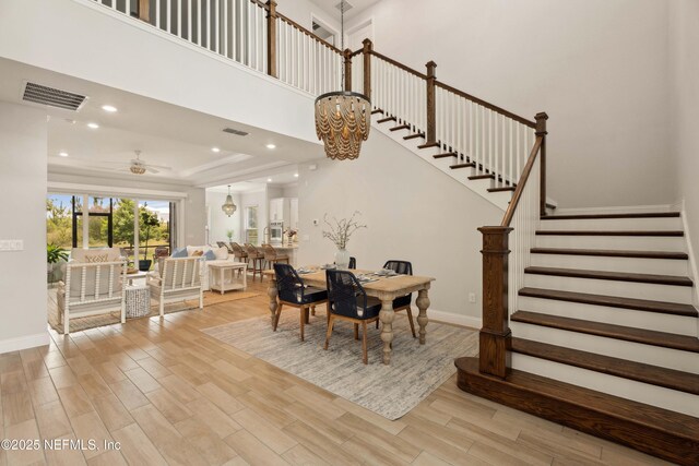 228 Waterline Dr, Saint Johns, FL 32259 - dining area featuring light wood-style flooring, stairway, baseboards, a ceiling fan, and recessed lighting