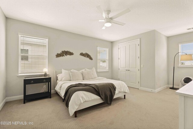 228 Waterline Dr, Saint Johns, FL 32259 - bedroom featuring light colored carpet, baseboards, and multiple windows