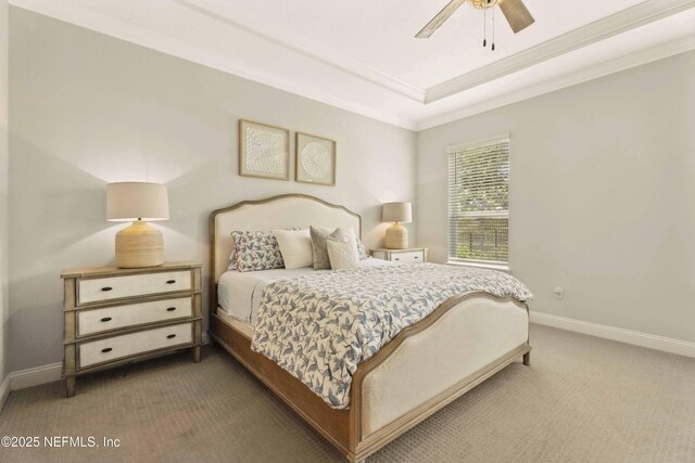 228 Waterline Dr, Saint Johns, FL 32259 - carpeted bedroom featuring baseboards, a tray ceiling, crown molding, and a ceiling fan