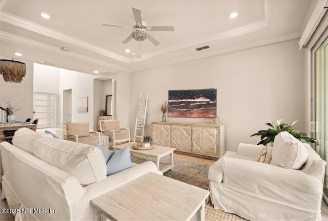 228 Waterline Dr, Saint Johns, FL 32259 - living area featuring a tray ceiling, ceiling fan, recessed lighting, ornamental molding, and wood finished floors