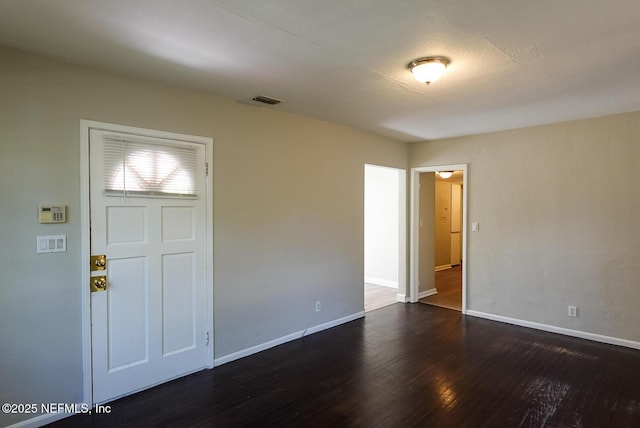 3763 Valley Rd, Jacksonville, FL 32207 - entryway featuring dark wood-style flooring and baseboards