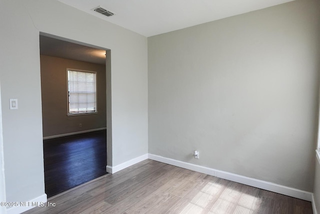 3763 Valley Rd, Jacksonville, FL 32207 - unfurnished room featuring wood finished floors and baseboards