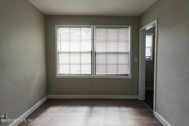 3763 Valley Rd, Jacksonville, FL 32207 - empty room with wood finished floors and baseboards