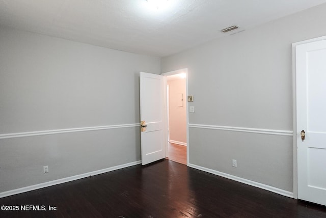 3763 Valley Rd, Jacksonville, FL 32207 - unfurnished room featuring wood finished floors and baseboards