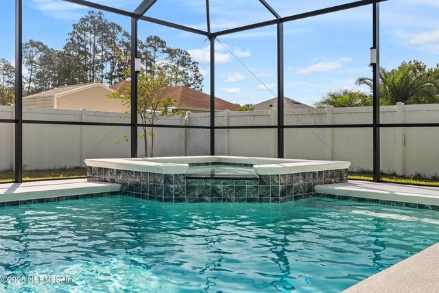 90 Lancelot Dr, Palm Coast, FL 32137 - view of pool with a pool with connected hot tub and a lanai