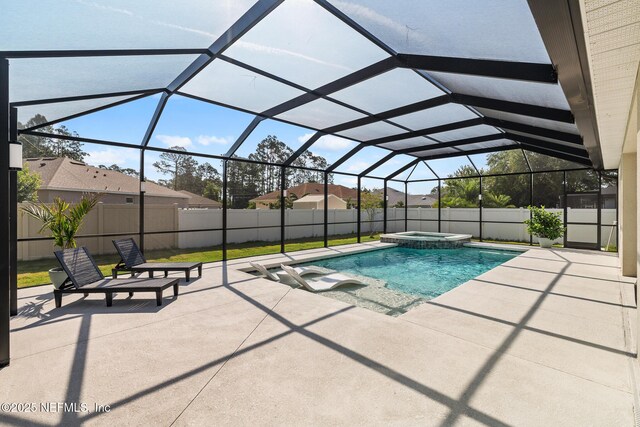 90 Lancelot Dr, Palm Coast, FL 32137 - view of swimming pool featuring a patio area, a pool with connected hot tub, a lanai, and a fenced backyard