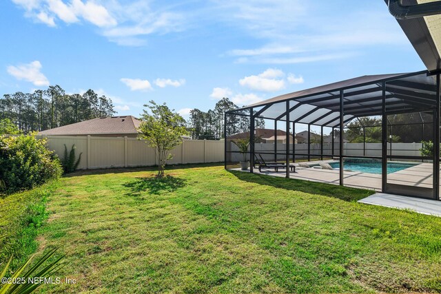 90 Lancelot Dr, Palm Coast, FL 32137 - view of yard with a patio
