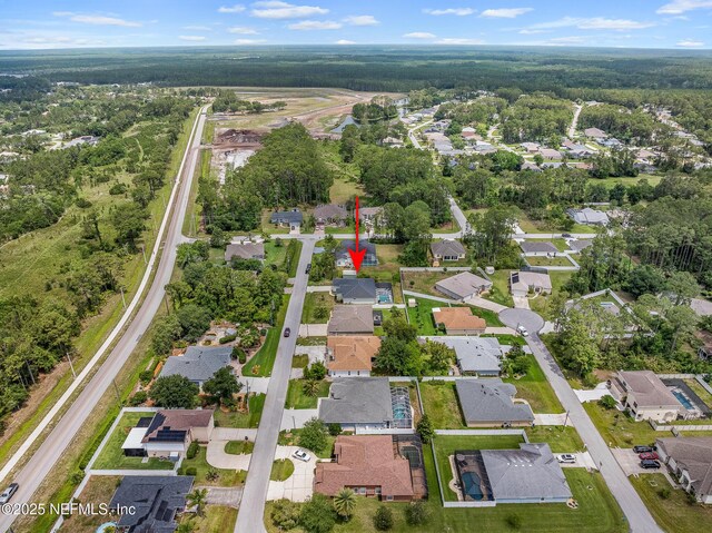 90 Lancelot Dr, Palm Coast, FL 32137 - aerial view of property and surrounding area featuring nearby suburban area