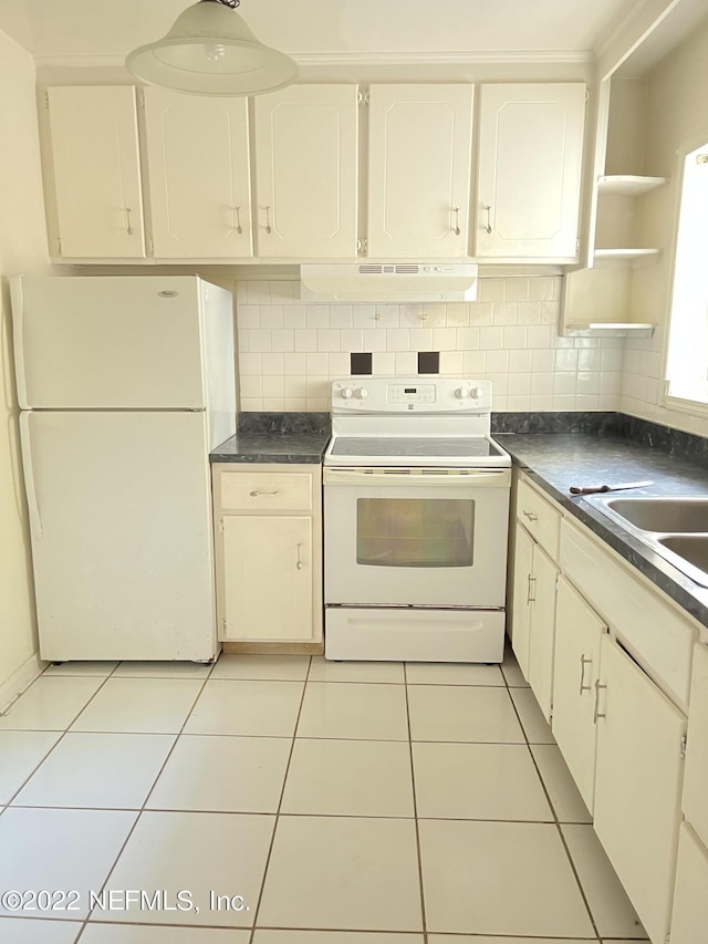 5715 Wiltshire St, Jacksonville, FL 32211 - kitchen featuring white appliances, under cabinet range hood, dark countertops, backsplash, and light tile patterned floors