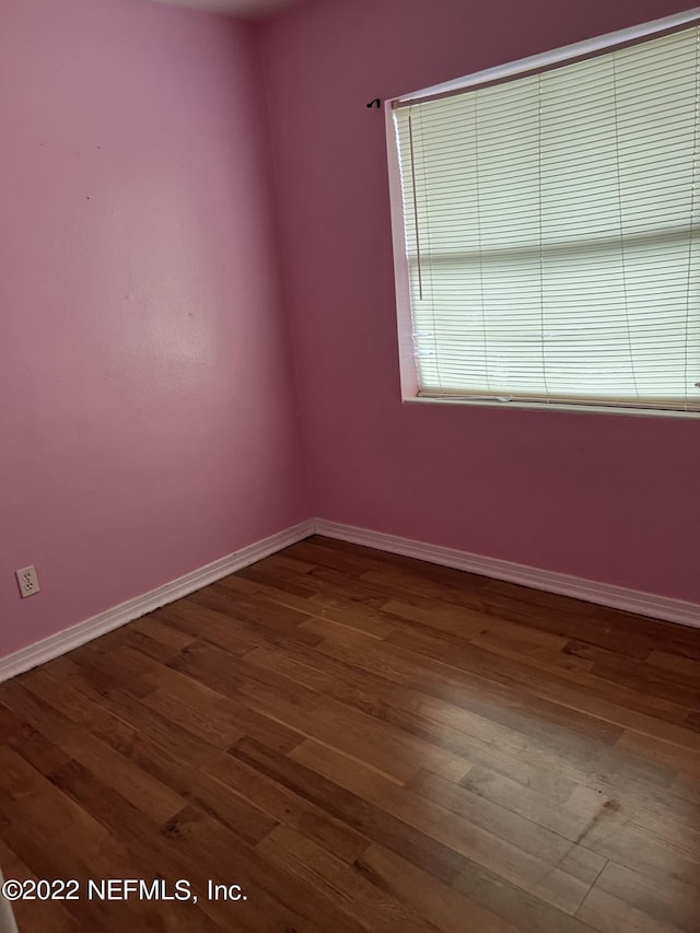 5715 Wiltshire St, Jacksonville, FL 32211 - unfurnished room featuring dark wood-type flooring and baseboards