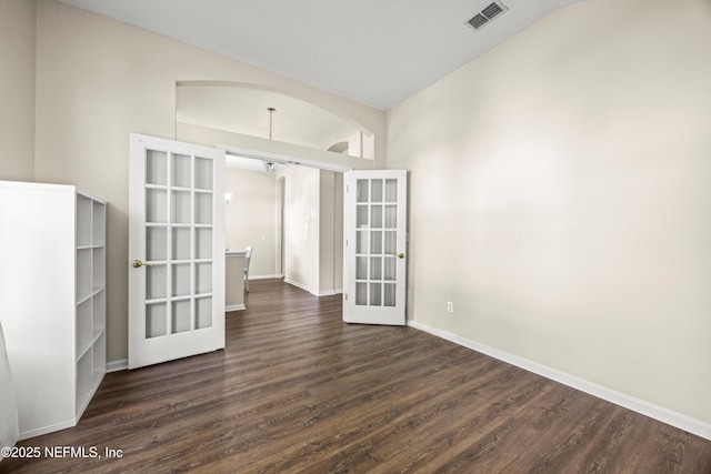 528 Sparrow Branch Cir, Saint Johns, FL 32259 - unfurnished room with french doors, dark wood-style floors, baseboards, and lofted ceiling