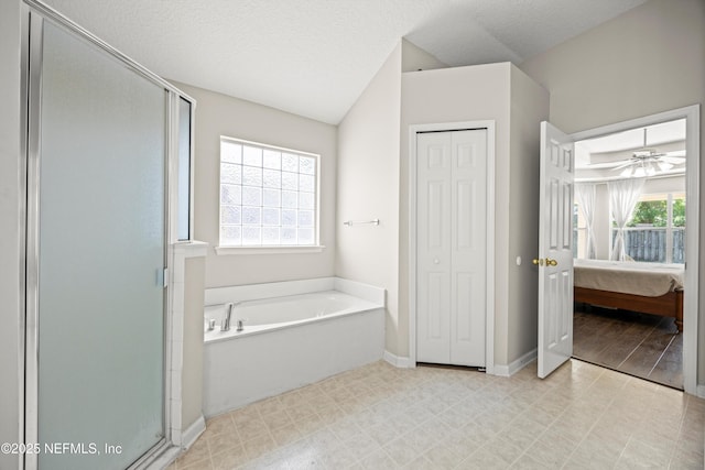 528 Sparrow Branch Cir, Saint Johns, FL 32259 - full bathroom featuring a garden tub, a stall shower, ensuite bathroom, a closet, and baseboards