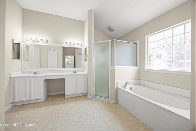 528 Sparrow Branch Cir, Saint Johns, FL 32259 - bathroom with a stall shower, a garden tub, baseboards, and double vanity