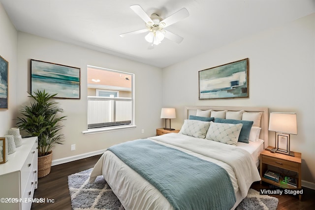 528 Sparrow Branch Cir, Saint Johns, FL 32259 - bedroom with dark wood finished floors, baseboards, and a ceiling fan