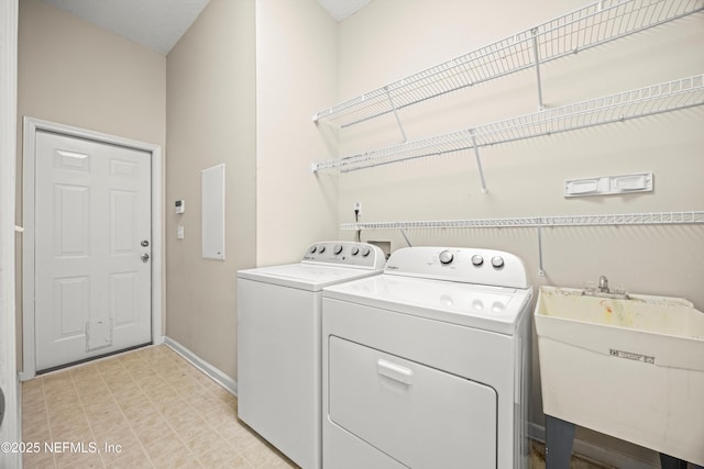 528 Sparrow Branch Cir, Saint Johns, FL 32259 - laundry room with separate washer and dryer and baseboards