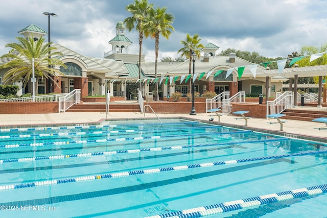 528 Sparrow Branch Cir, Saint Johns, FL 32259 - community pool featuring a pergola and a patio area