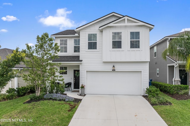 571 Meadow Creek Dr, Saint Johns, FL 32259 - view of front of home with board and batten siding, a garage, concrete driveway, and a front lawn