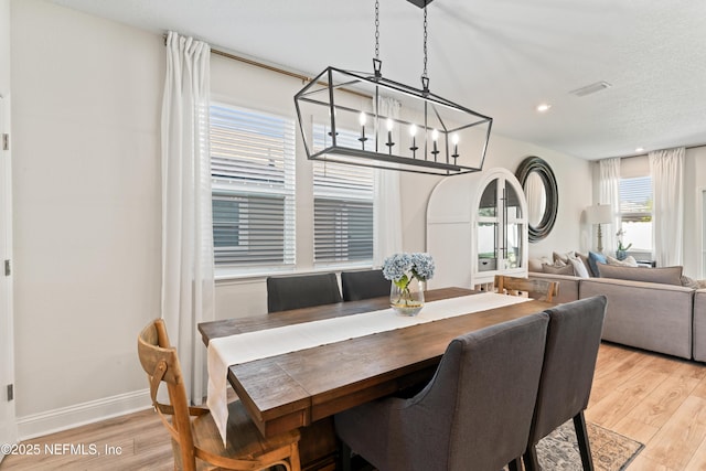 571 Meadow Creek Dr, Saint Johns, FL 32259 - dining room featuring light wood-type flooring, a chandelier, baseboards, and recessed lighting