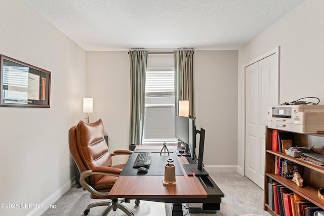571 Meadow Creek Dr, Saint Johns, FL 32259 - office area featuring light colored carpet, a textured ceiling, and baseboards