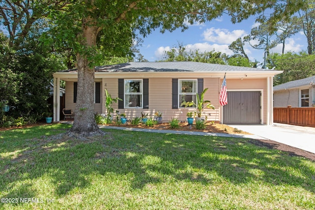 4241 Lexington Ave, Jacksonville, FL 32210 - ranch-style home with a garage and concrete driveway